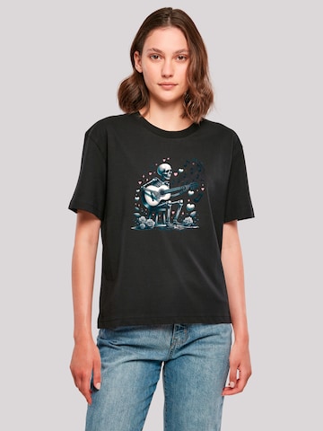 F4NT4STIC T-Shirt 'Skelett Spielt Gitarre, Musik, Liebe' in Schwarz: Vorderseite
