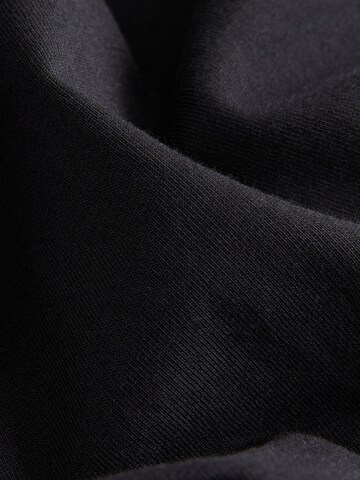 T-Shirt Next en noir