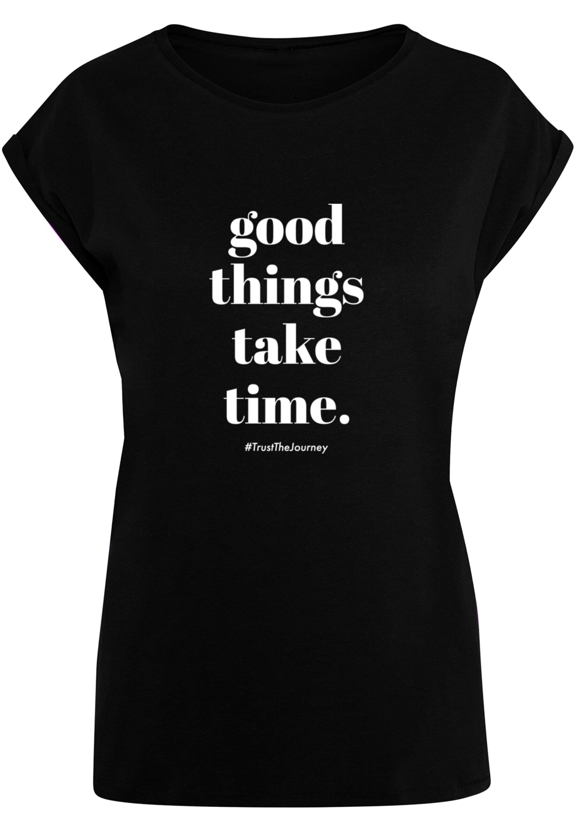 Merchcode T-Shirt 'Good Things Take Time' in Schwarz: Vorderseite
