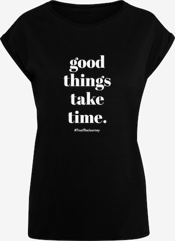 Merchcode Shirt 'Good Things Take Time' in Zwart: voorkant