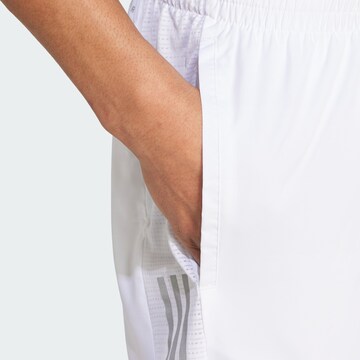 Regular Pantalon de sport 'Own the Run' ADIDAS SPORTSWEAR en blanc
