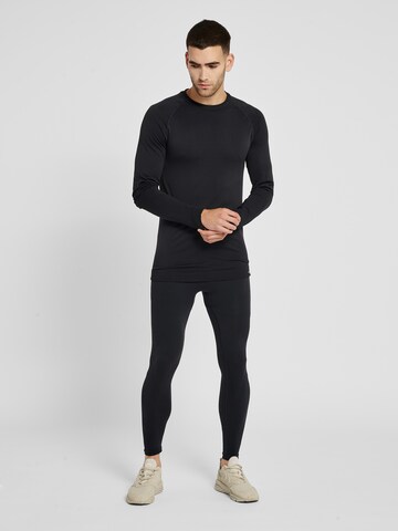 Hummel Skinny Sports trousers in Black: front