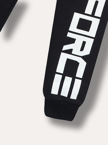 WINKIKI Regular Pants in Black