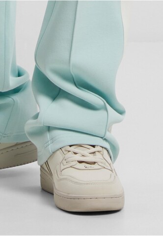 Regular Pantalon Karl Kani en bleu