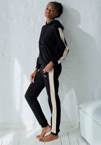 Tapered Pantaloni di s.Oliver in nero