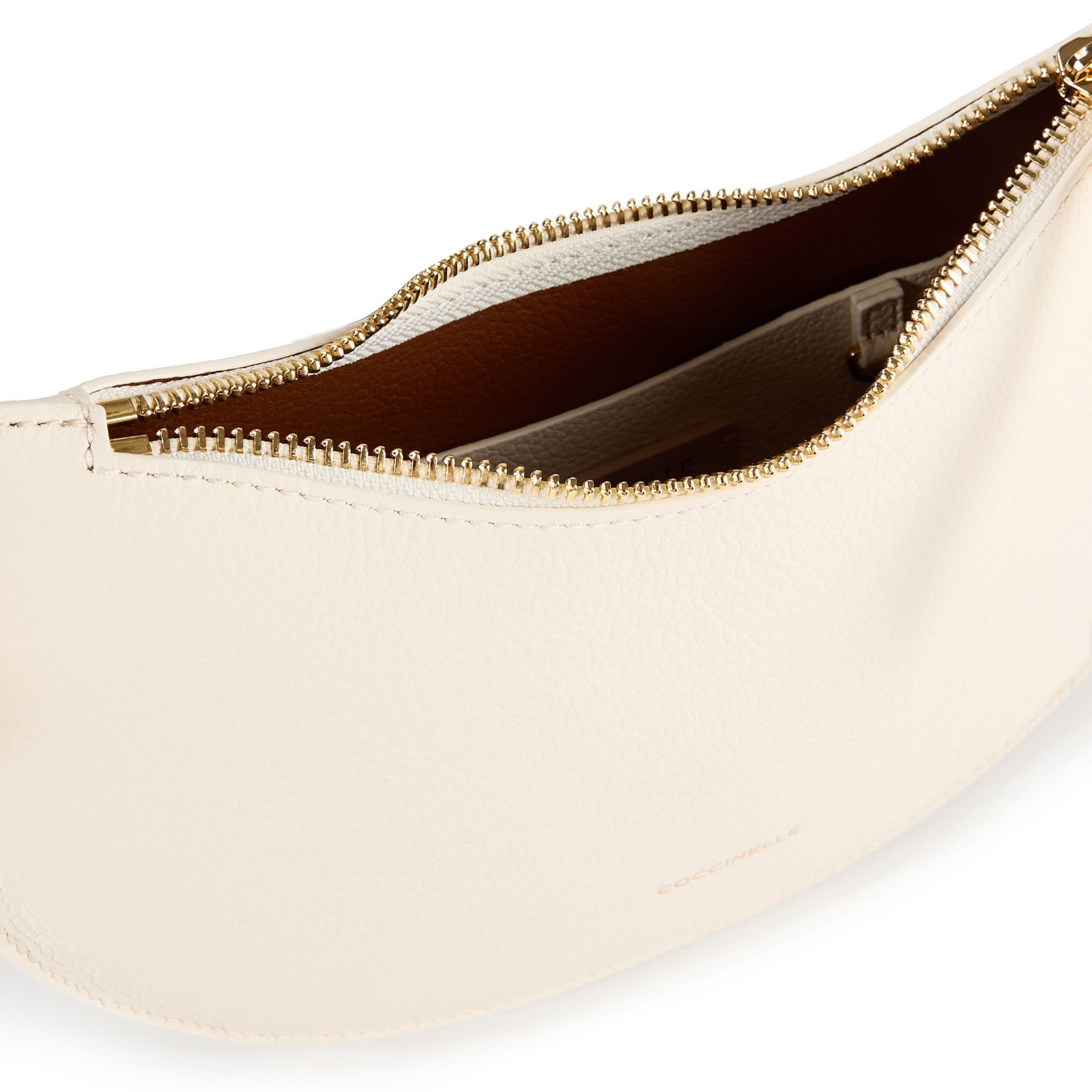 Coccinelle Чанта за през рамо 'Sunup' в бежово