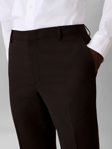 Coupe slim Pantalon à plis Calvin Klein en noir