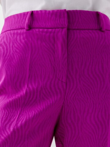 Scalpers Flared Pants in Pink