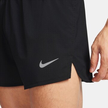 NIKE Обычный Спортивные штаны 'FAST' в Черный