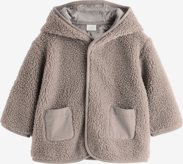 Next Jopa iz flisa | rjava barva: sprednja stran