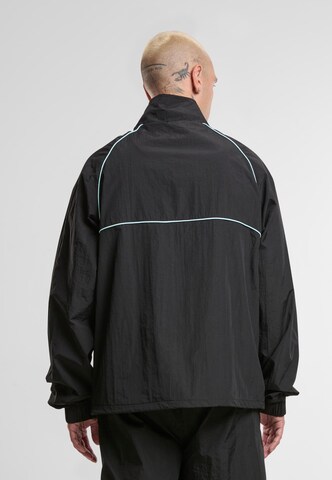 Veste mi-saison Karl Kani en noir