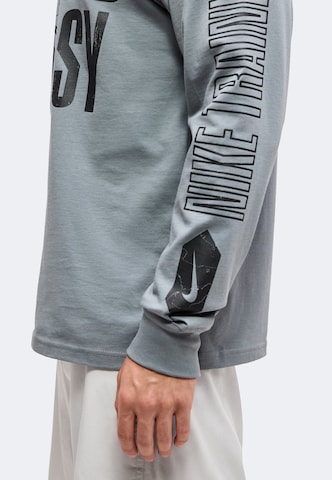 NIKE - Camisa funcionais em cinzento: lateral