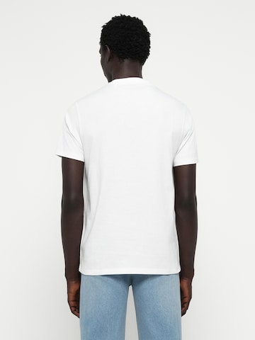 GUESS Bluser & t-shirts i hvid