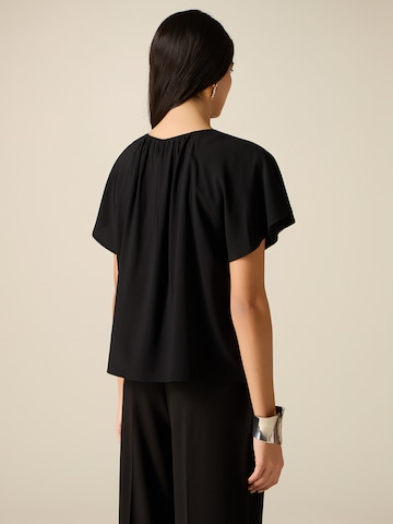 Camicia da donna di oltre in nero
