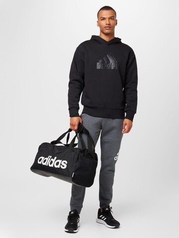 ADIDAS SPORTSWEAR Athletic Sweatshirt 'Future Icons Badge Of Sport' in Black