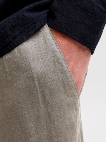 JACK & JONES Loose fit Chino trousers 'JJKarl Lawrence' in Green