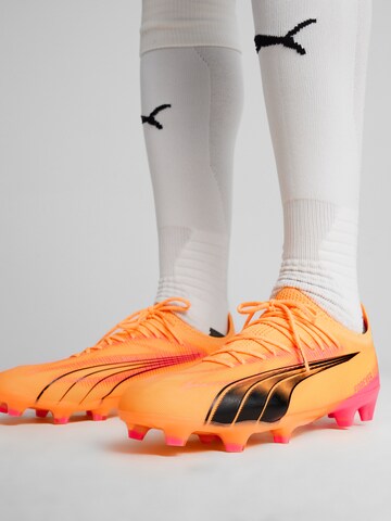 Chaussure de foot 'ULTRA ULTIMATE' PUMA en jaune : devant