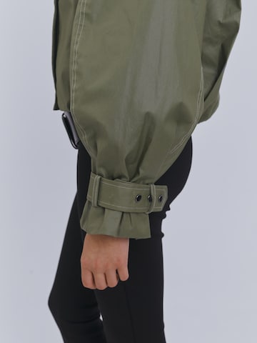AEMMI Between-season jacket 'WAXED' in Green