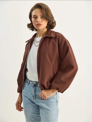 Bianco Lucci Tussenjas in Bruin