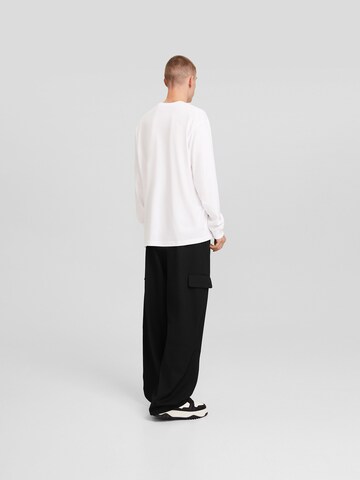 Bershka Loose fit Cargo Pants in Black