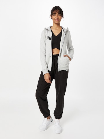 PUMA Sportsweatjacke 'Ess' in Grau