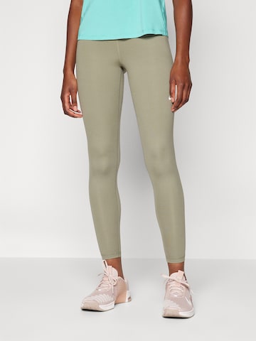 NIKE Skinny Sportnadrágok - zöld: elől