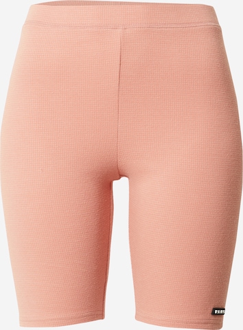 VANS Skinny Leggings 'WM WELL SUITED' in Pink: front