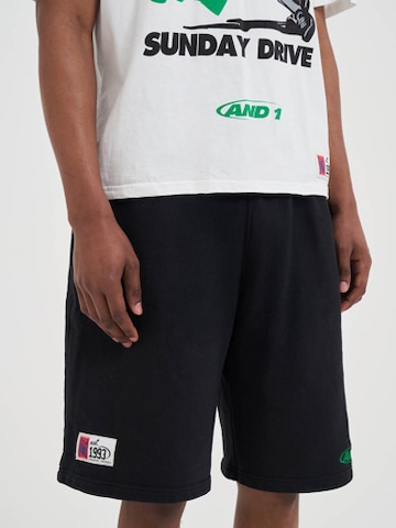 AND1 Štandardný strih Nohavice - Čierna: predná strana