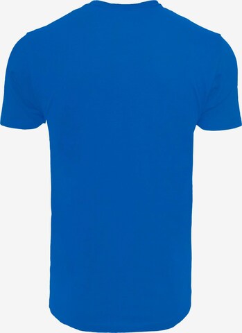 T-Shirt 'Caution Hot' Merchcode en bleu