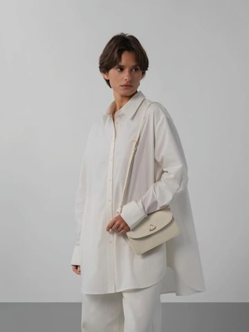LANCASTER Paris Torba na ramię 'Lancaster Pochette A rabat aimanté Paris Philos Ecru' w kolorze beżowy