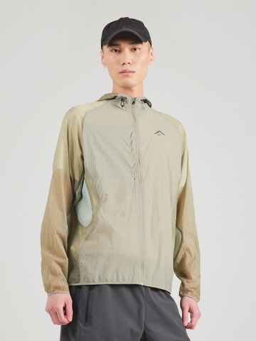 Nike Sportswear Between-season jacket 'TRAIL AIREEZ' in Green: front