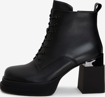 CESARE GASPARI Booties in Black: front