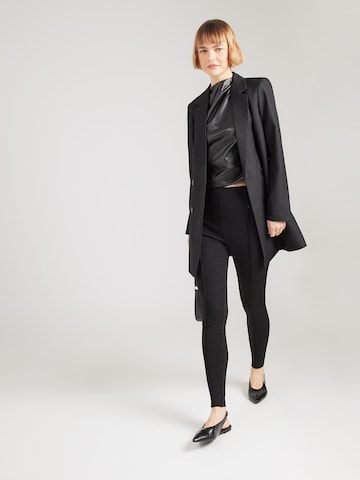 Skinny Leggings 'Rosalie' ABOUT YOU en noir