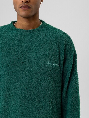 Pullover 'Kayan' di Dandalo in verde