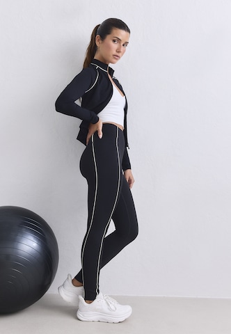 Aim'n Skinny Spodnie sportowe 'Sense' w kolorze czarny