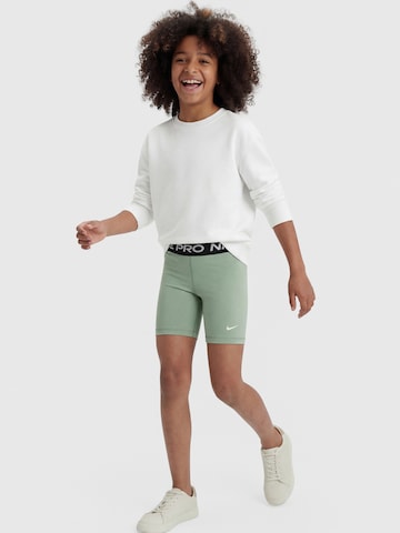 NIKE - Skinny Calças de desporto 'Nike Pro' em verde: frente