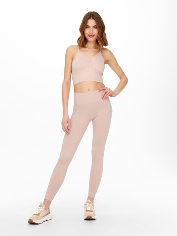 Skinny Pantalon de sport ONLY PLAY en rose