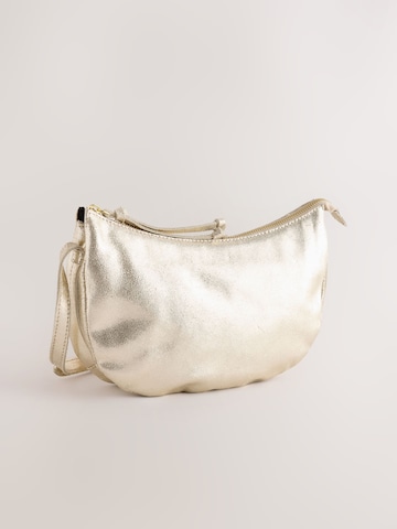 Next Crossbody bag in Gold