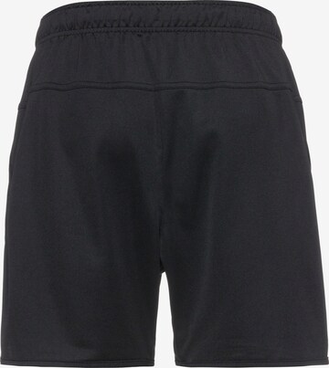 NIKE Regular Workout Pants in Black