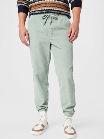 TOM TAILOR DENIM Tapered Pants in Green: front