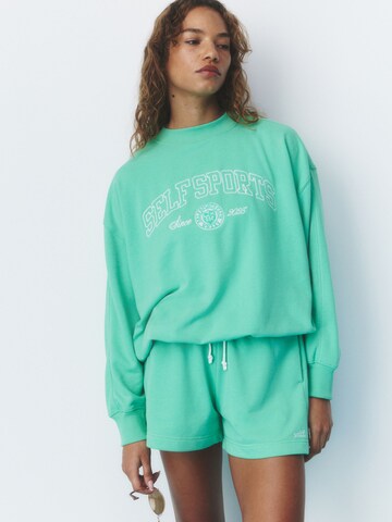 self. Sweatshirt in Groen: voorkant
