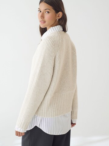 Next Genser i beige