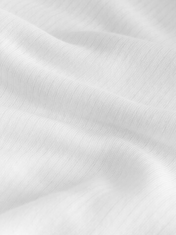 Next - Camiseta térmica en blanco