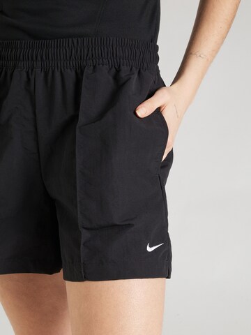 Nike Sportswear Ohlapna forma Hlače 'ESSNTL' | črna barva