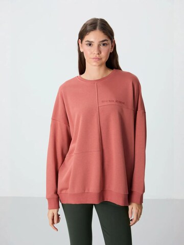 Sweat-shirt Tommy Life en rouge