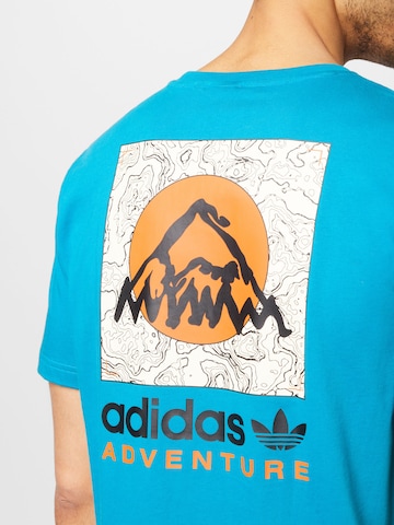 ADIDAS ORIGINALS T-Shirt 'Adventure Mountain Back' in Blau