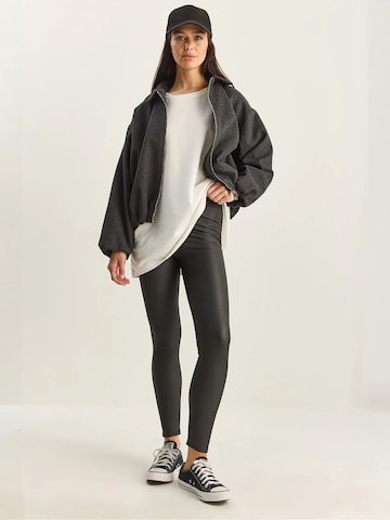 Bianco Lucci Skinny Leggings in Schwarz: Vorderseite
