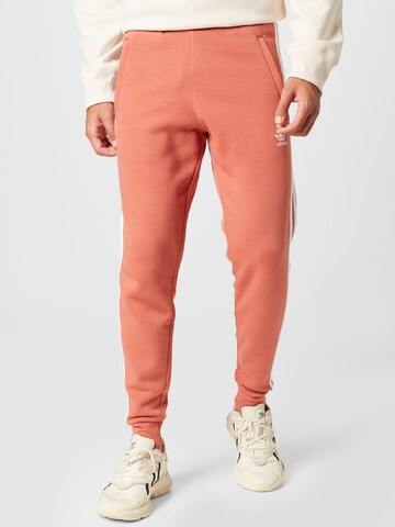 ADIDAS ORIGINALS Tapered Pants 'Adicolor Classics 3-Stripes' in Pink: front