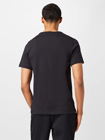 Nike Sportswear - Camisa em preto