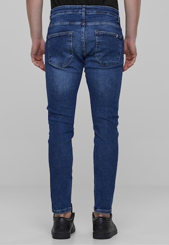 Karl Kani Slimfit Jeans in Blau